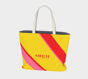This oversize cotton canvas tote features our signature color blocking in yellow, red and pink adorned with our Sweat Goddess logo