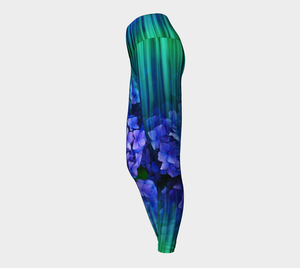 High waisted compression leggings with blue and green imagery and subtle blue florals