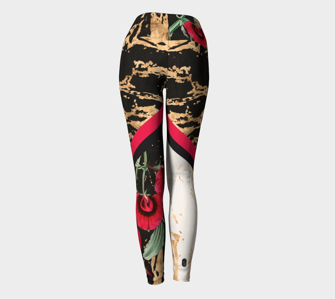 Red botanicals splash onto a gold splattered background on these compression leggings