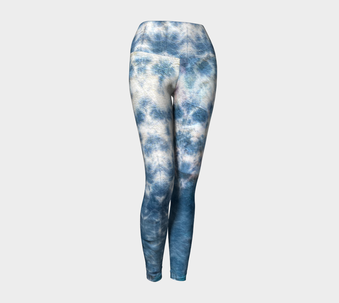 A beautiful tie dye in denim colors adorn these compression leggings