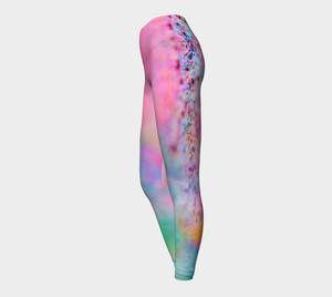 a playful pink candy inspired print adorn these high waisted compression leggings 