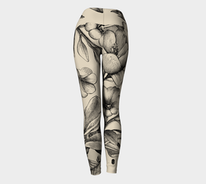 Compression leggings featuring gorgeous vintage botanicals set subtly against an ivory background.