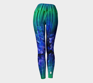 High waisted compression leggings with blue and green imagery and subtle blue florals