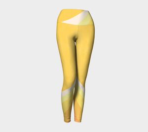 Yellow Mod color blocking adorn these high-waisted compression leggings