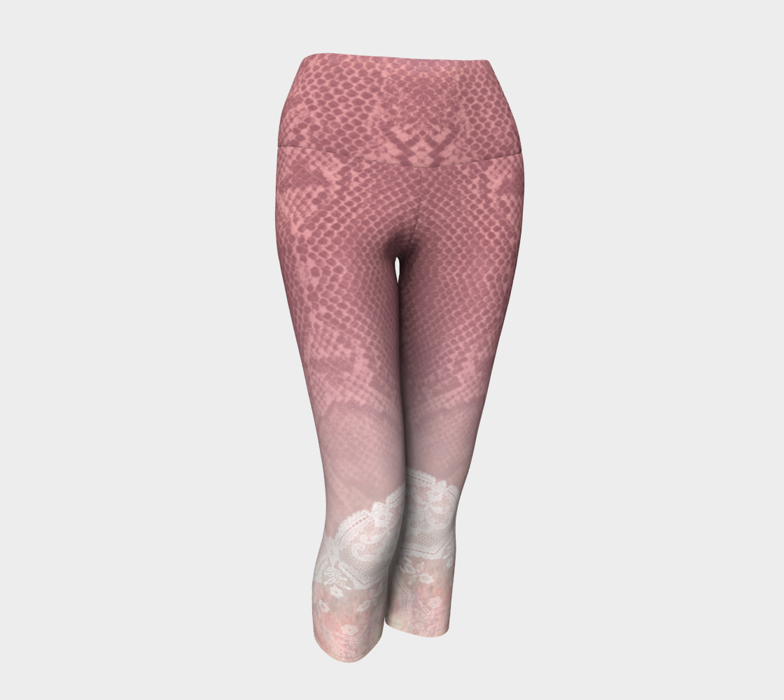 Pink hued snakeskin mingle with delicate lace on these capri length compression leggings