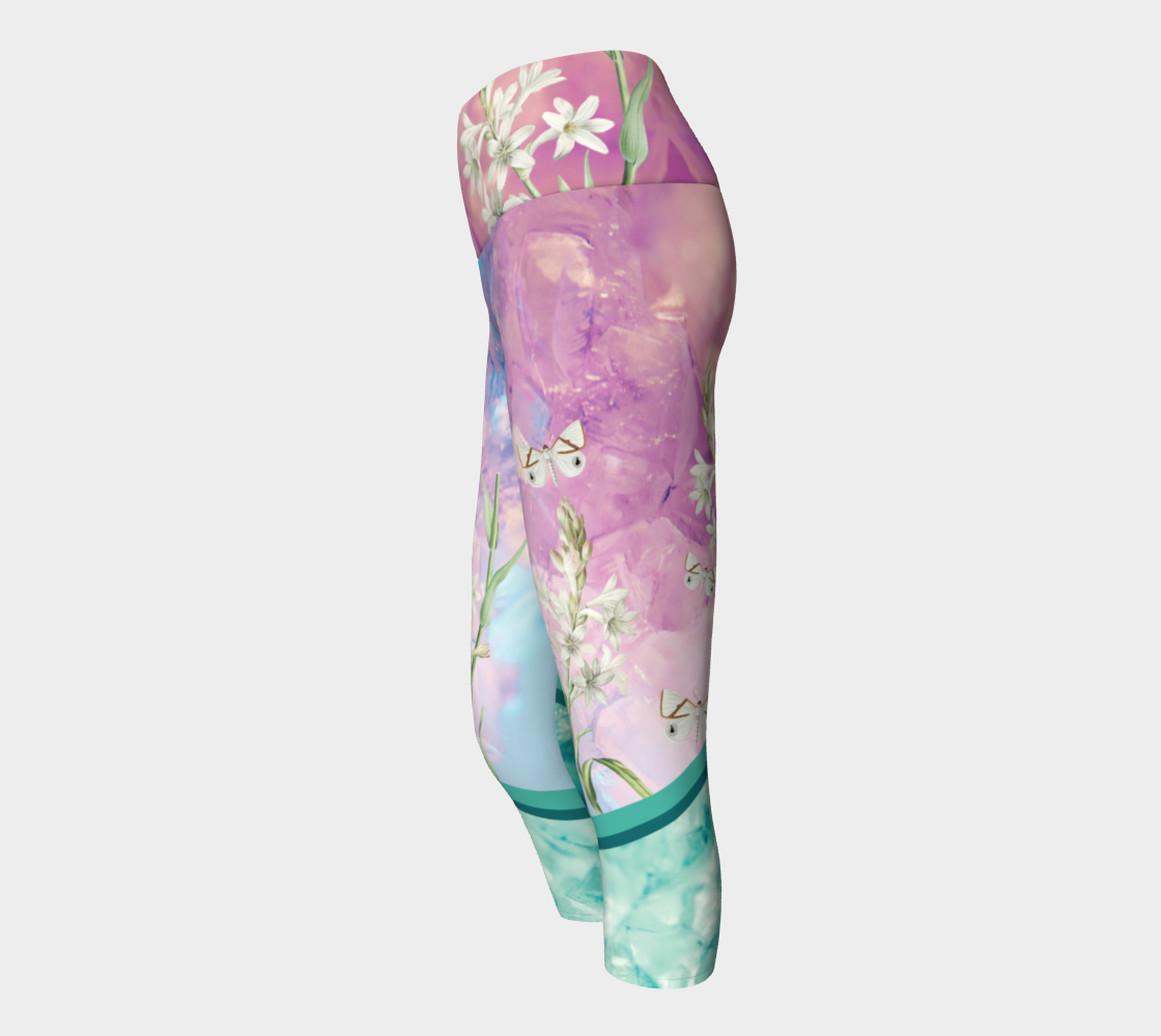 A unique blend of crystal imagery and butterfly florals adorns these capri length  leggings