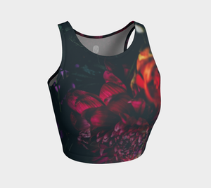 Dark moody florals sit against a midnight sky on this athletic top