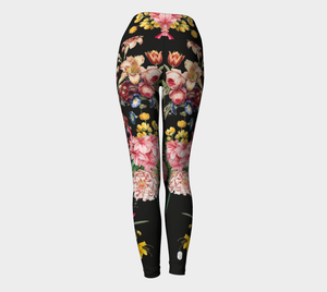 A deep black midnight acts as the background for brilliant beautiful florals on these compression leggings