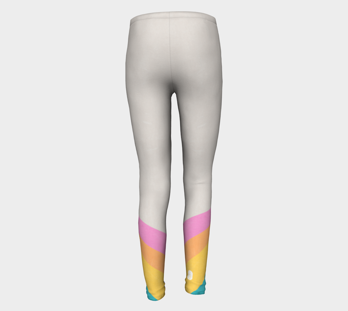 A color block style featuring a colorful rainbow adorn these big kid leggings