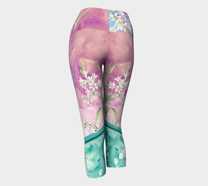 A unique blend of crystal imagery and butterfly florals adorns these capri length  leggings