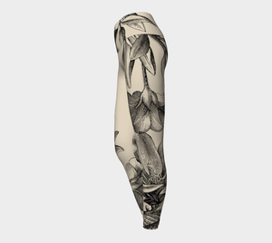 Compression leggings featuring gorgeous vintage botanicals set subtly against an ivory background.