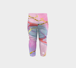 Ethereal prints mixed with pinks and pops of gold adorn these baby leggings