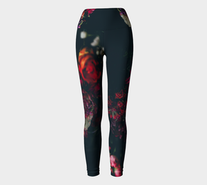 Dark moody florals sit against a midnight sky on these compression leggings