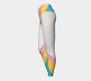 A color block style featuring a colorful rainbow adorn these compression leggings