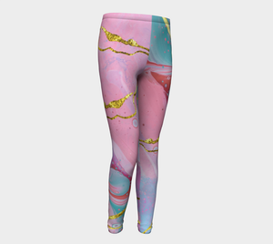 Ethereal prints mixed with pinks and pops of gold adorn these big kid leggings