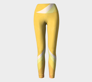 Yellow Mod color blocking adorn these high-waisted compression leggings