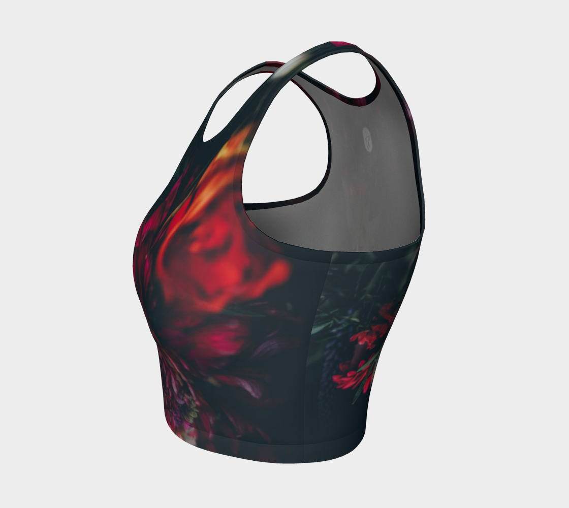 Dark moody florals sit against a midnight sky on this athletic top