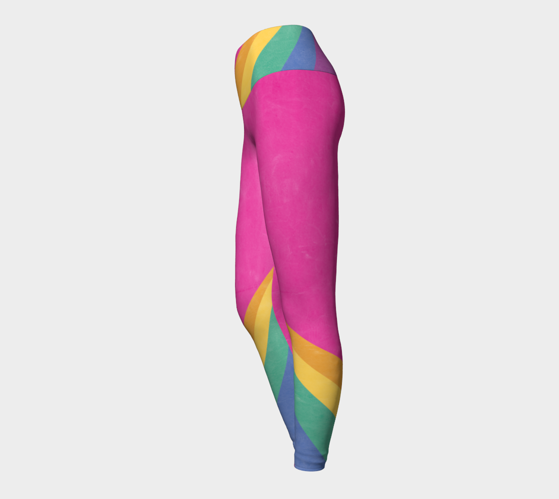 Rainbow color blocking against a bright pink backdrop on these compression leggings