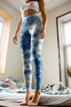 A beautiful tie dye in denim colors adorn these compression leggings