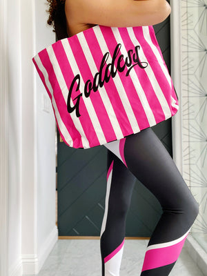 Black and pink striped luxe tote bag with the word "Goddess" featured. Fully lined with 2 interior pockets and a magnetic closure.