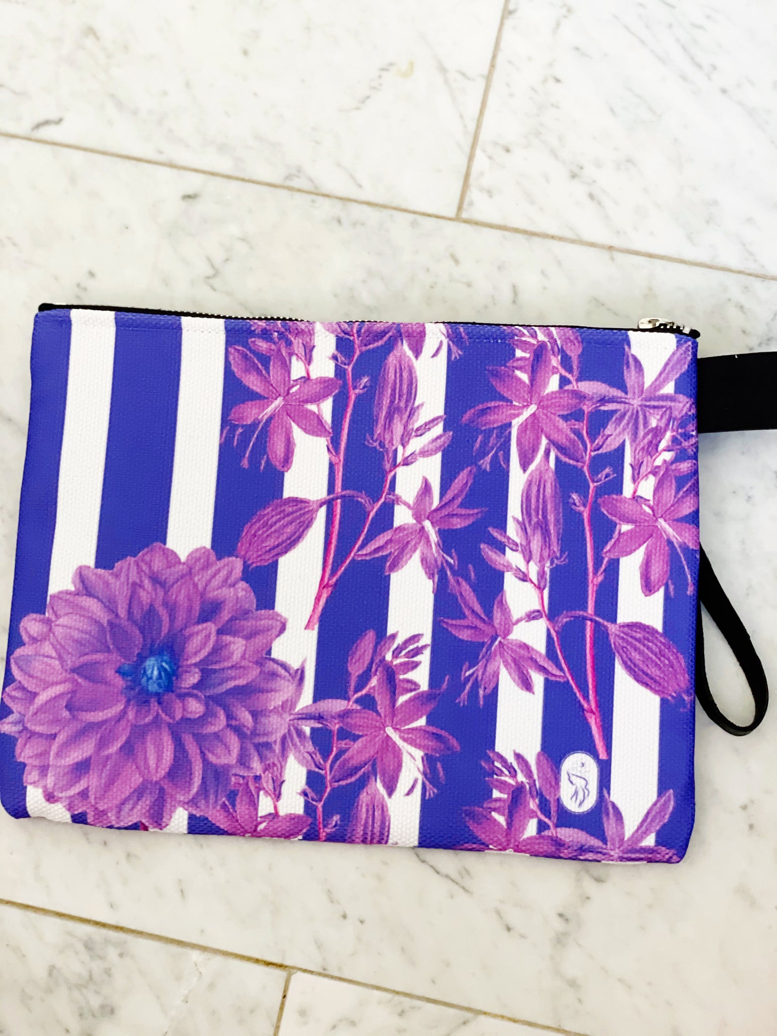 Luxe canvas pouch, fully lined with vegan leather details, featuring our purple stripes and florals print with the word "Goddess" on the front.
