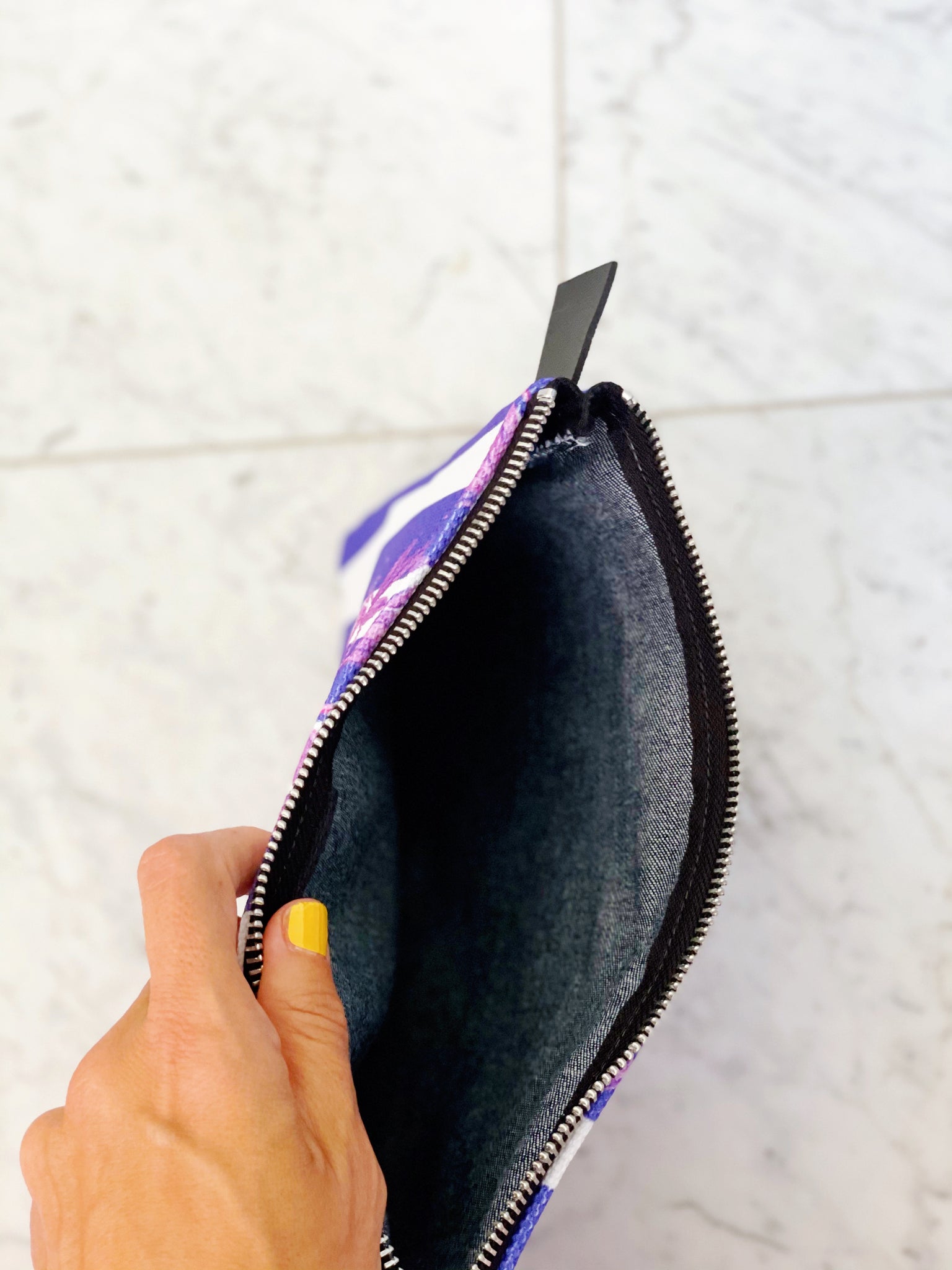 Luxe canvas pouch, fully lined with vegan leather details, featuring our purple stripes and florals print with the word "Goddess" on the front.