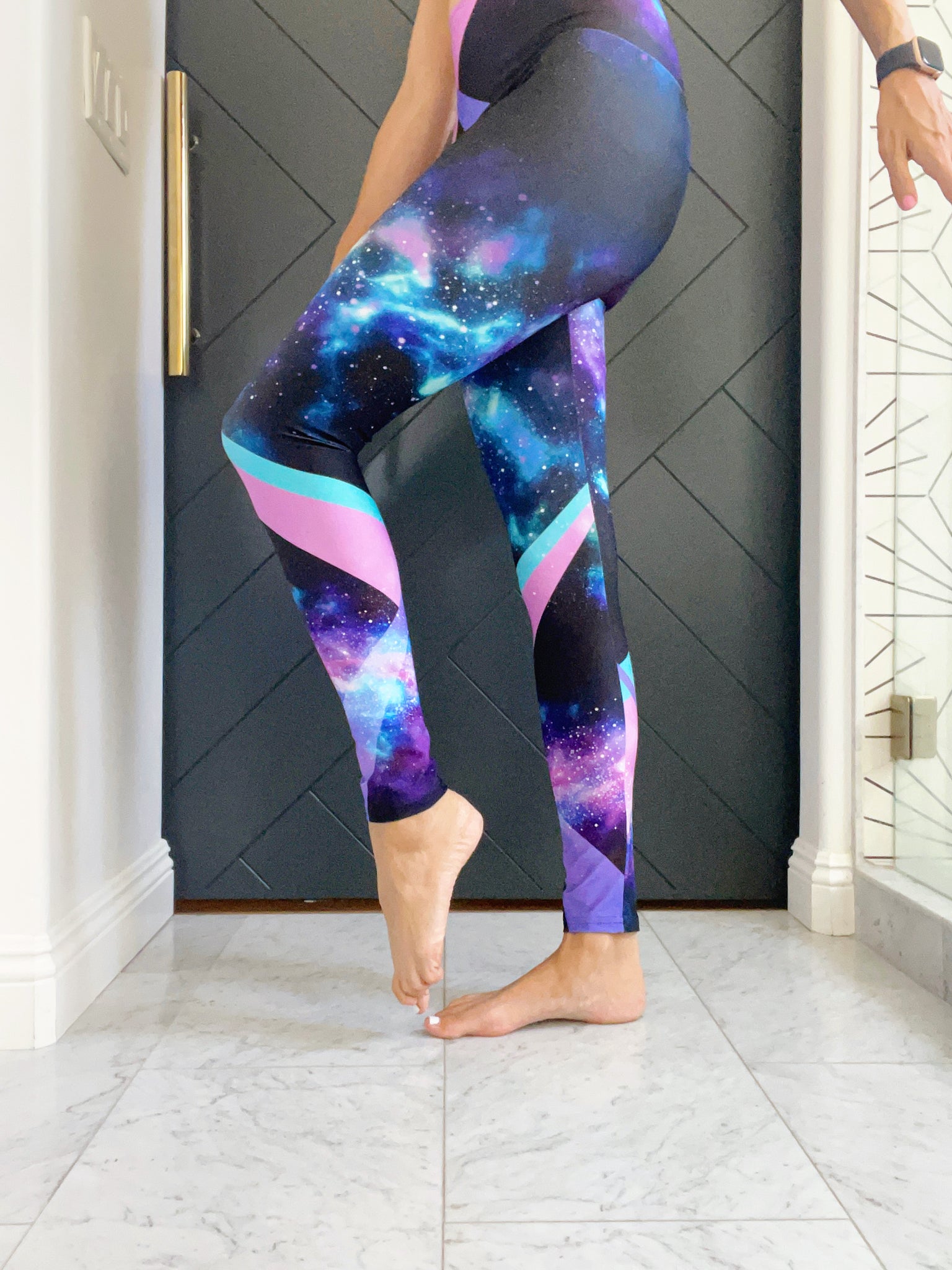 high wasted compression leggings featuring beautiful galaxy imagery and colorful stripes