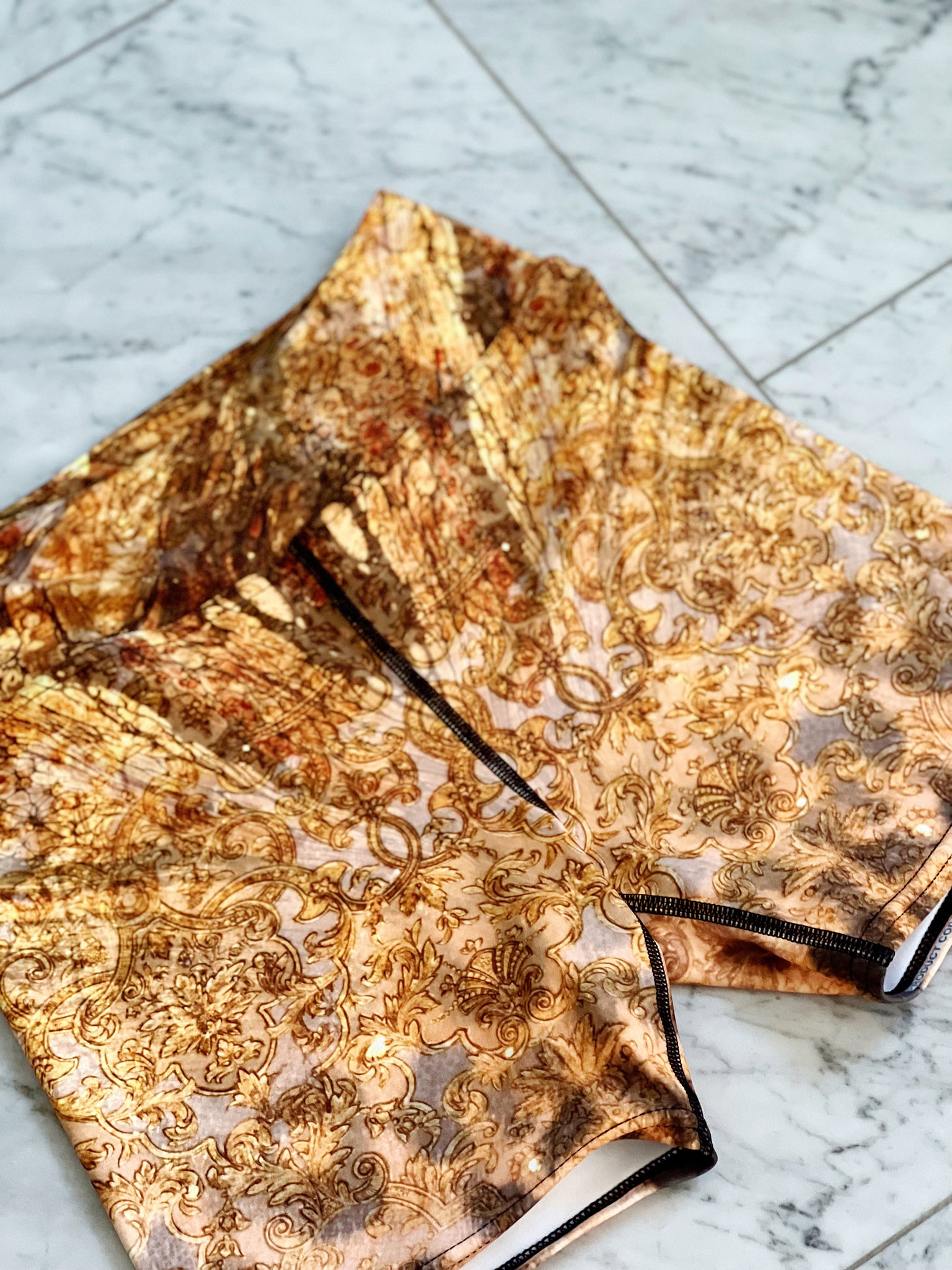 Gold leopard print yoga shorts