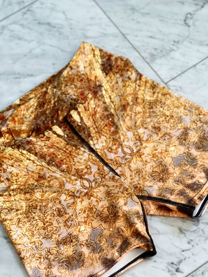 Gold leopard print yoga shorts