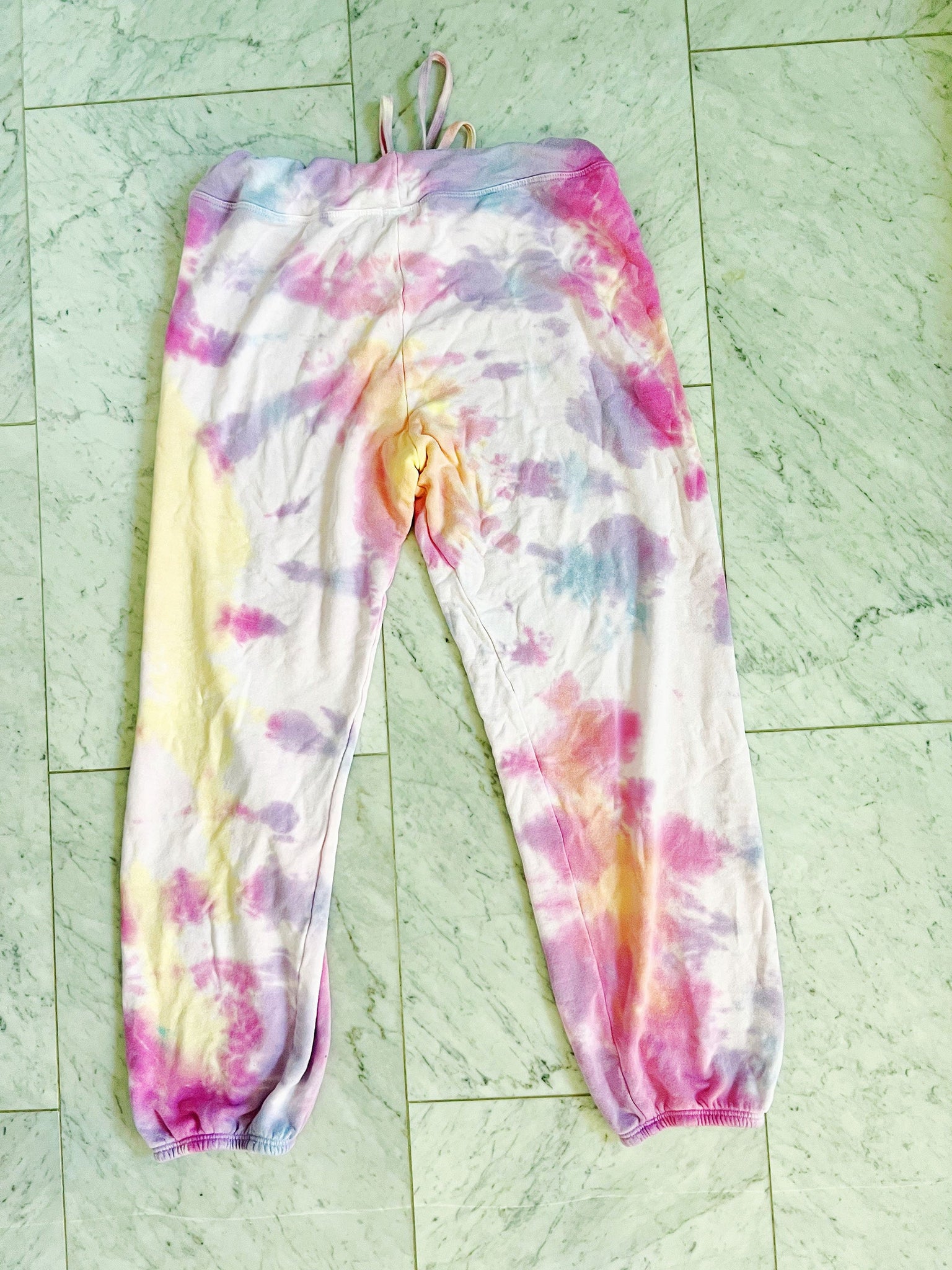 Hand dyed ultrasoft sweatpants in a sunrise color palette.