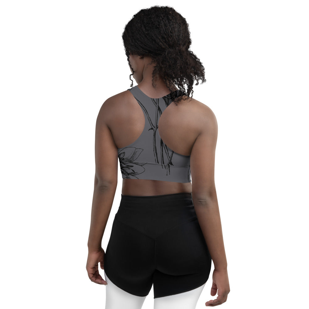 Signature Compression Sports bra featuring black vintage florals against a charcoal background.