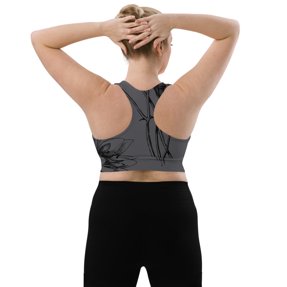 Signature Compression Sports bra featuring black vintage florals against a charcoal background.
