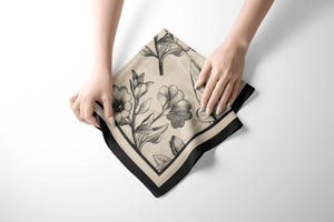 100% pure silk charmeuse luxury scarf featuring vintage botanicals against an ivory background.