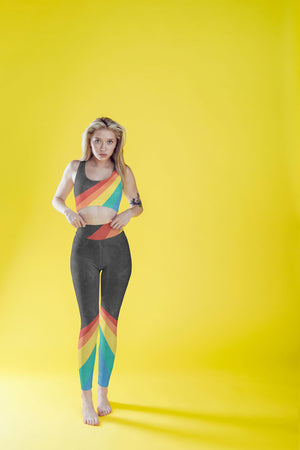 A color block style featuring a colorful rainbow on this athletic top.