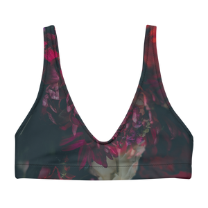 Sports bralette with removable pads made from recycled materials featuring dark moody florals 
