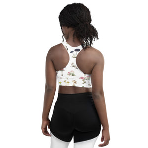 Our must have sports bra adorned with vintage mushrooms in a rainbow of colors