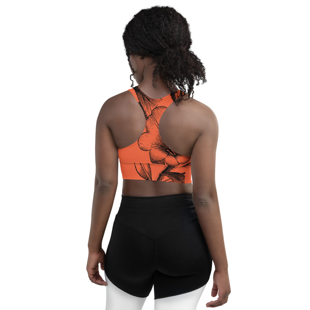 Signature sports bra with extra support featuring black vintage florals against a red background.