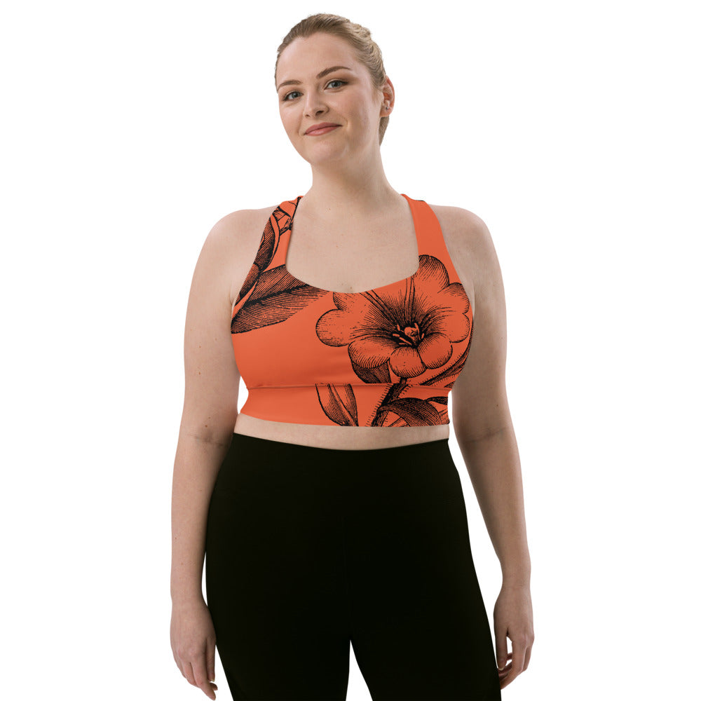 Signature sports bra with extra support featuring black vintage florals against a red background.