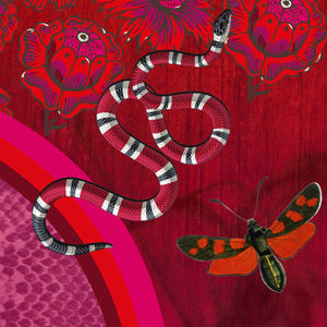 Billows of red clouds set amidst pink snakeskin, dusted with snakes and red butterflies on this athletic top