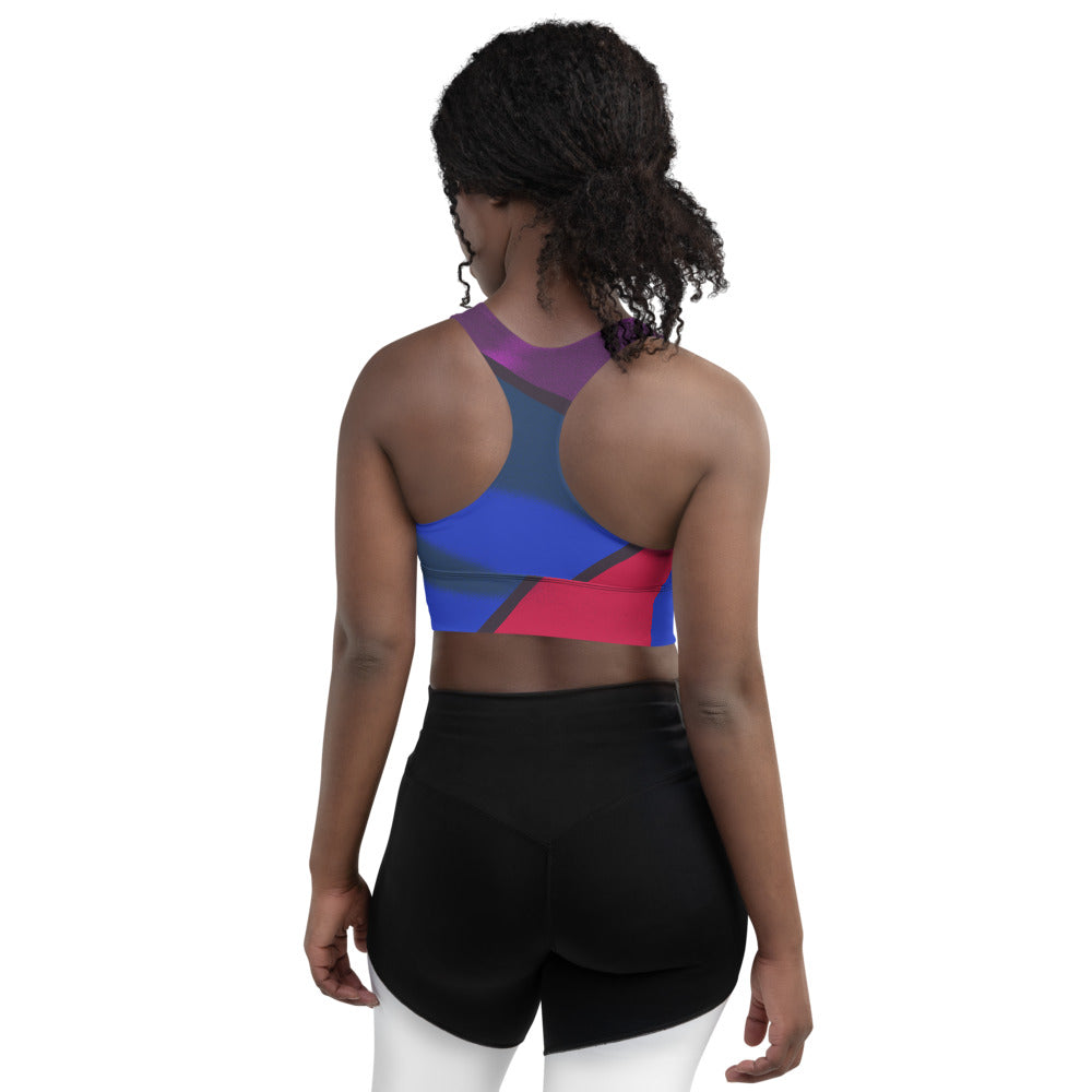 Color block print in vibrant pink, blue and red adorn this sports bra.