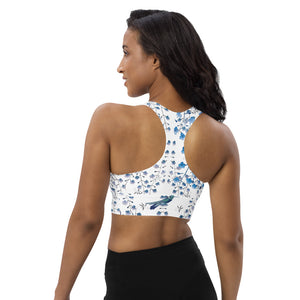Our signature sports bra featuring tiny florals and hummingbirds