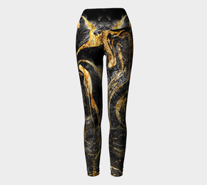 Black and Gold ethereal patterns evoke moon dust on these compression leggings.