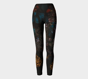 Moody dark florals adorn these high-waisted compression  leggings