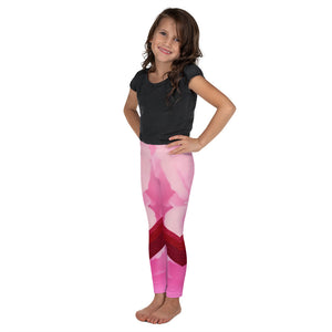 Bold pinks with red sparkle stripes on these little kid leggings