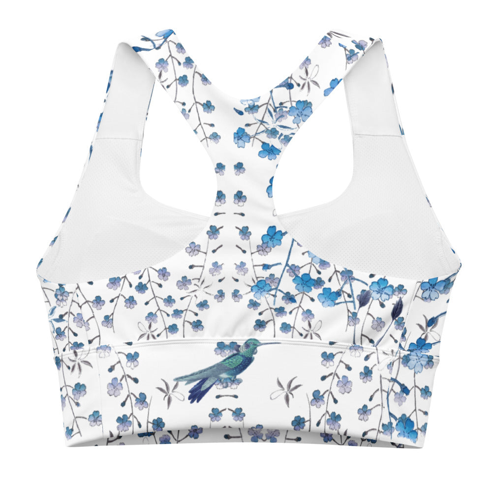 Our signature sports bra featuring tiny florals and hummingbirds