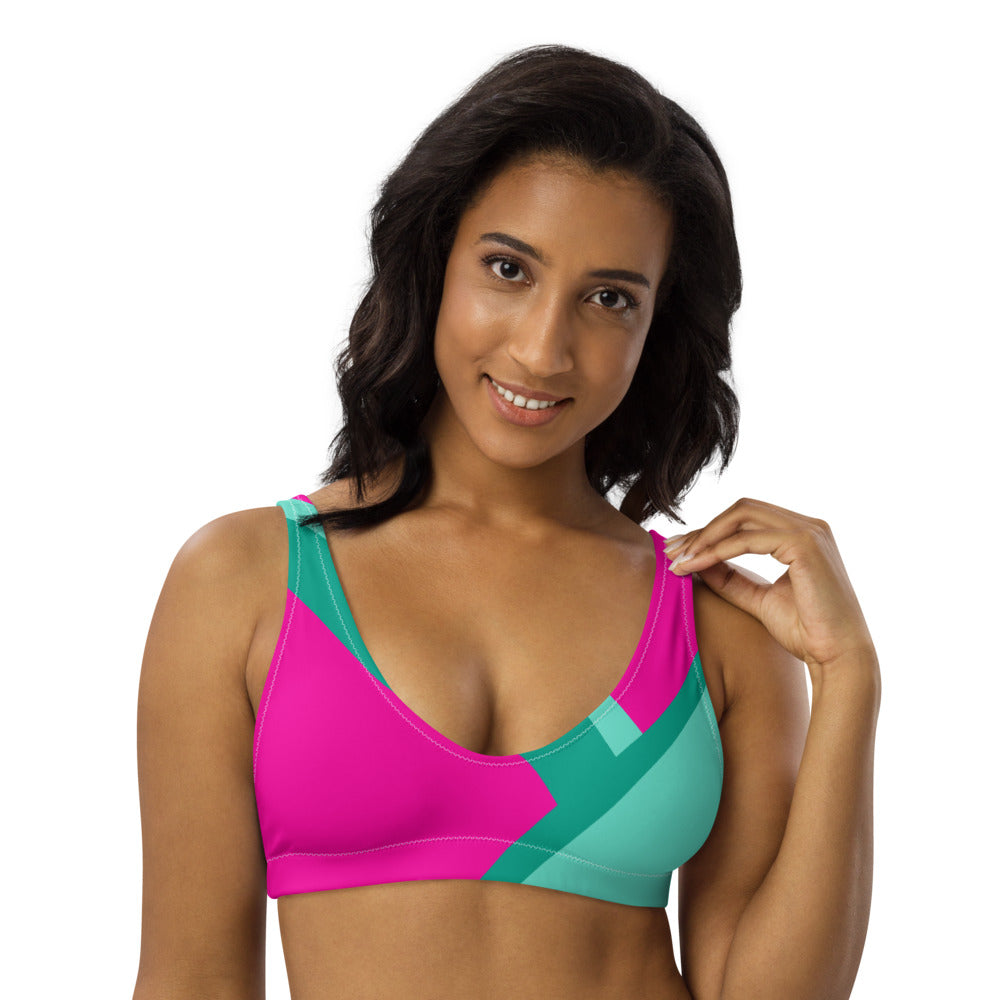 Recycled bikini sports bralette with removable pads shown in a vibrant mint & pink color palette