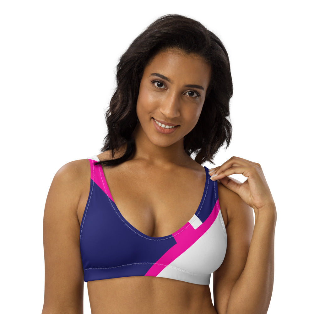Our signature color block style in a vibrant navy & pink, adorn this athletic bralette with removable pads.