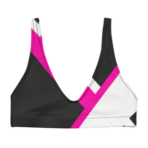 Recycled bikini sports bralette with removable pads shown in a vibrant pink and black signature color block print..