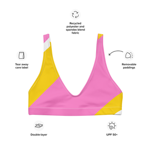 Recycled bikini sports bralette with removable pads in a playful pink, yellow and white color palette.