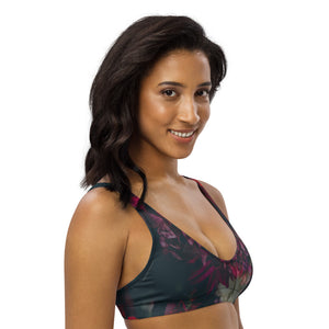 Sports bralette with removable pads made from recycled materials featuring dark moody florals 